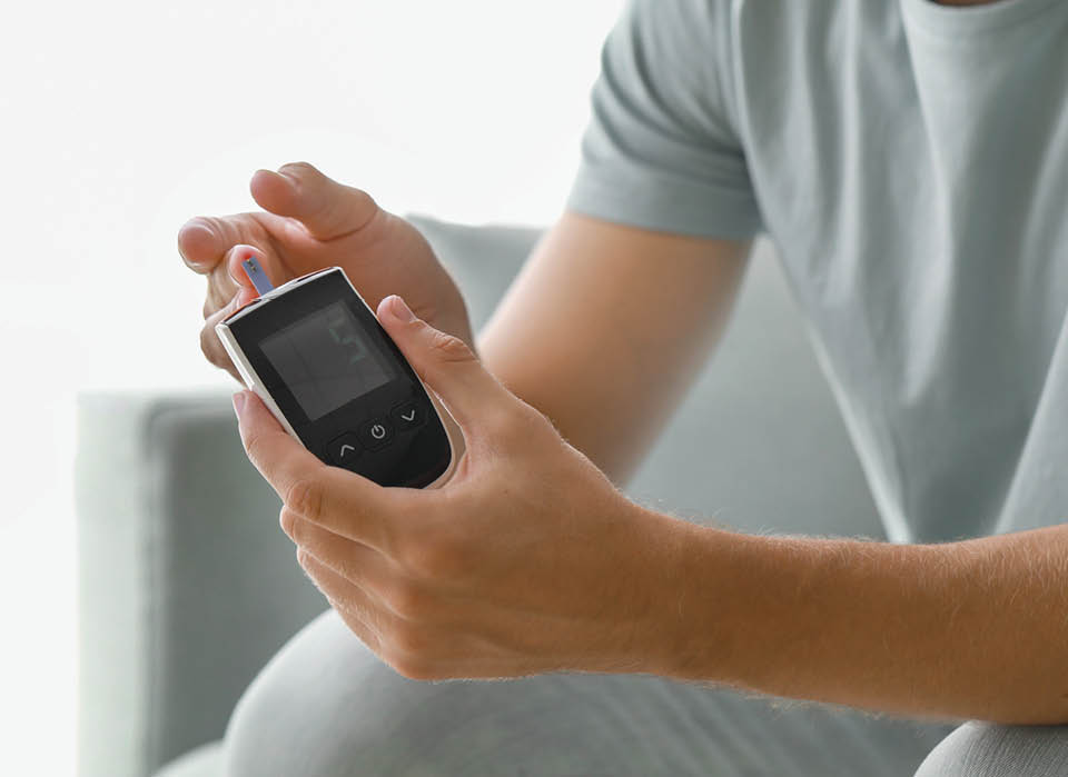 man-using-glucometer-to-test-for-diabetes